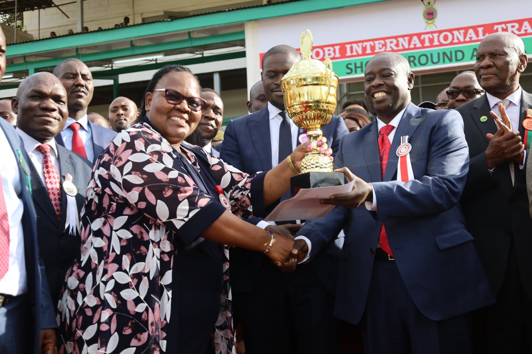DG receiving a trophy from the DP at the MNairobi international ASK show